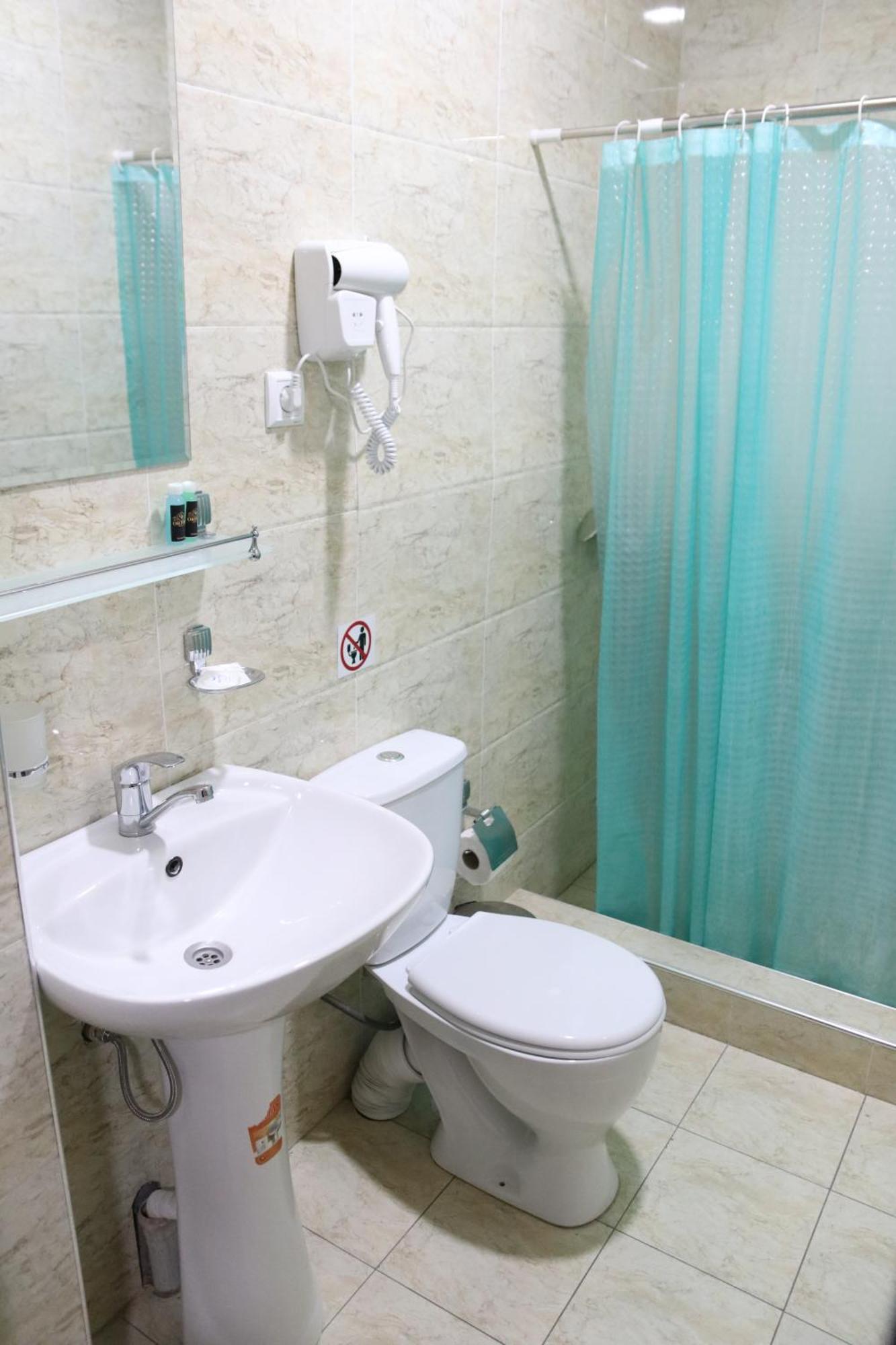 Orion Hotel Tasjkent Kamer foto