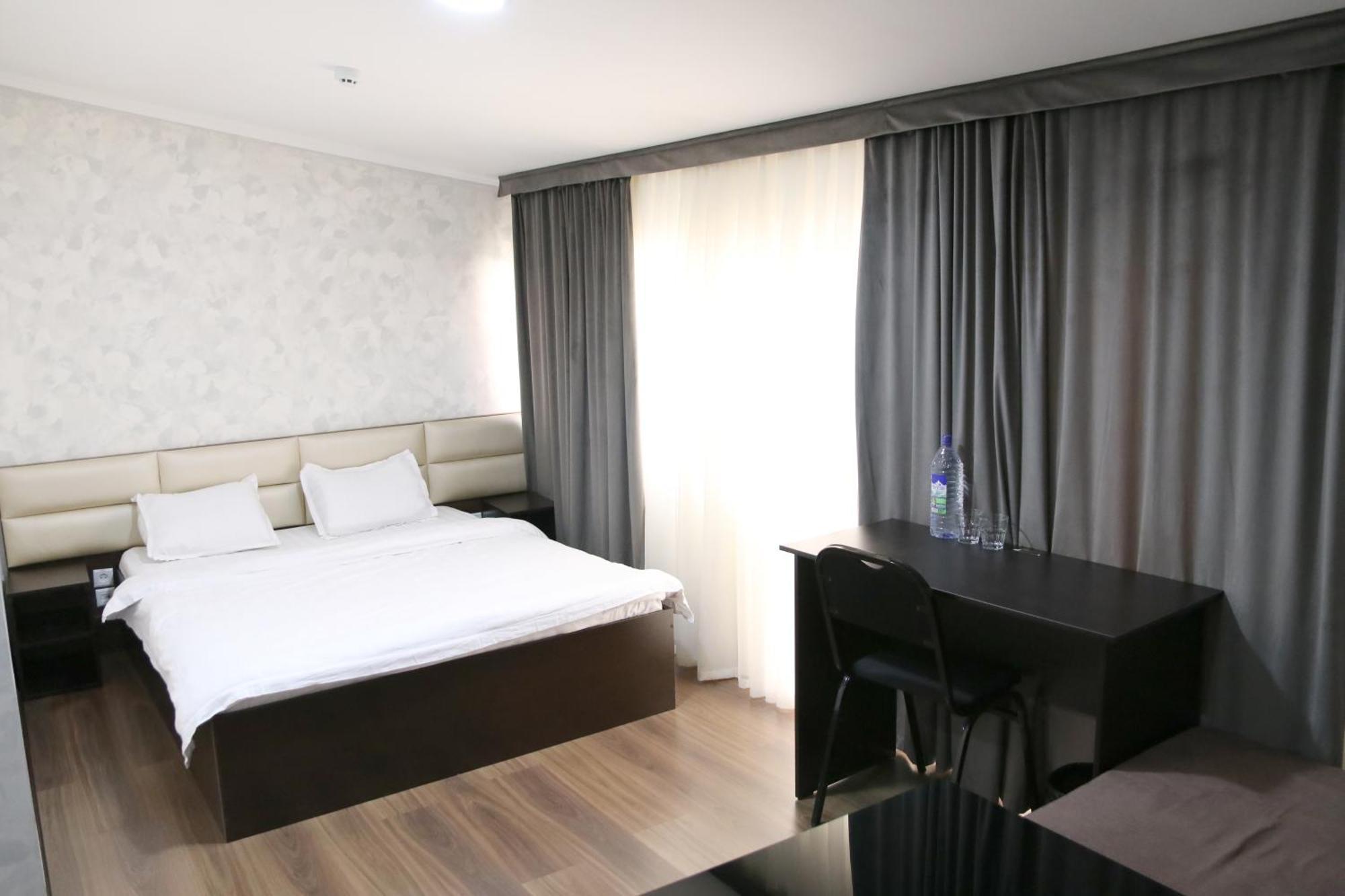 Orion Hotel Tasjkent Kamer foto